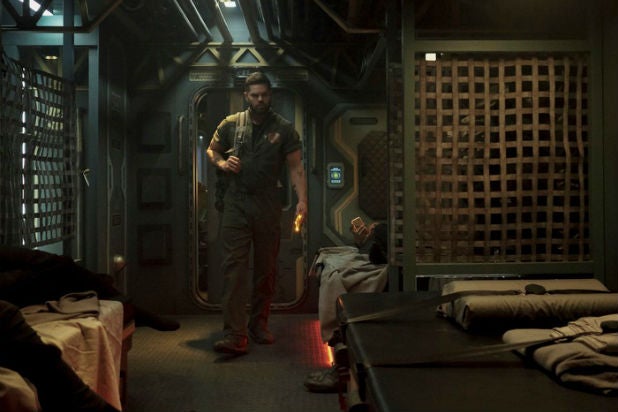 The-Expanse-Season-5-Amos-Burton-Wes-Chatham-Belter-Transport.jpg